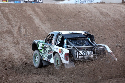 <img src= "pr4.jpg" alt= "a pro 4 truck racing around a dirt track" />